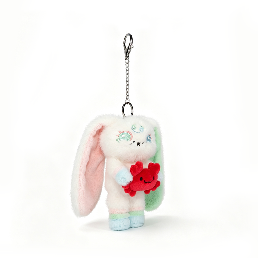 A Cancer Plush Keychain, this pastel bunny holds a red heart—perfect as a thoughtful Cancer Zodiac Gift.