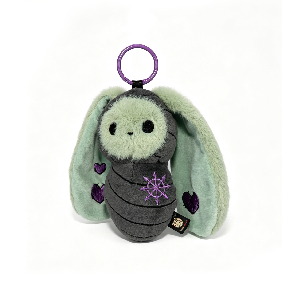 Bunnculus Plush Keychain: green-furred bunny with floppy ears, purple hearts, and a purple keyring on top.