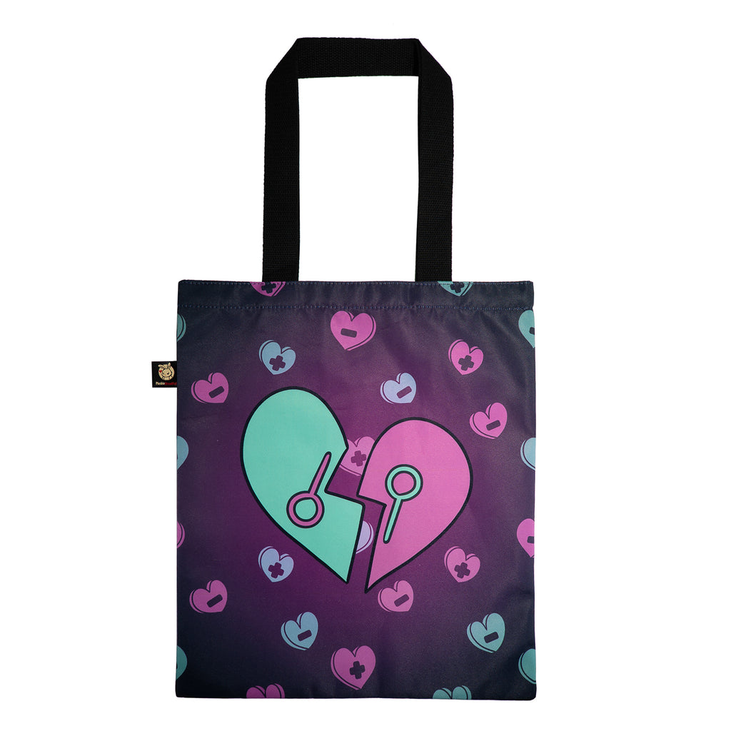 Purple tote with black handles, split heart design—ideal as a mental health gift or for carrying an emotional support bunny.