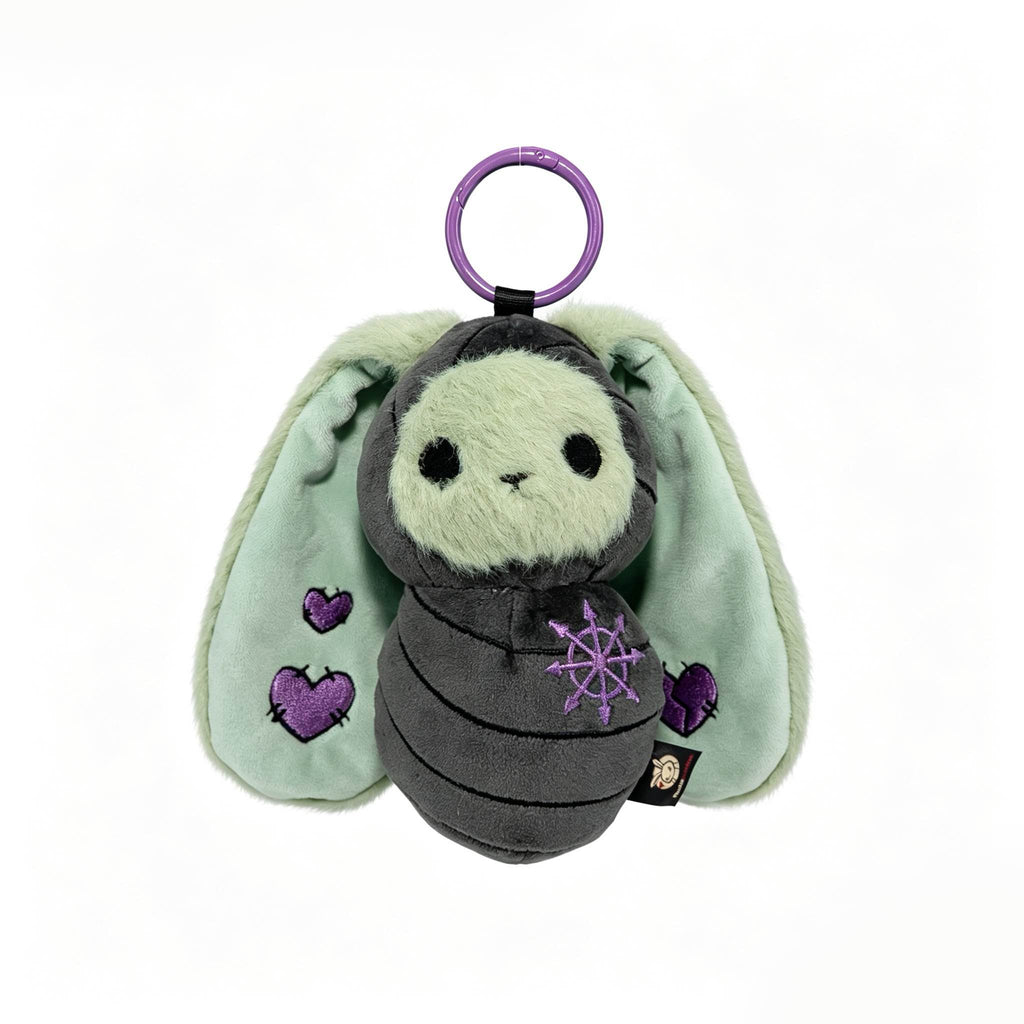 Bunnculus Plush Keychain: bunny keychain with mint green ears, purple hearts, and a purple ring, on white background.