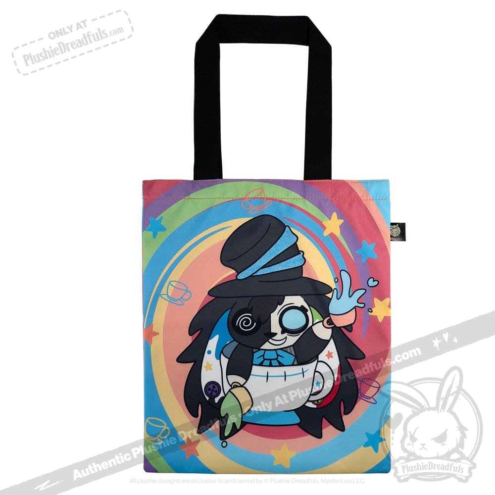 Colorful tote bag with an ADHD Mad Hatter cartoon in a hat, surrounded by swirls, stars, and teacup icons.