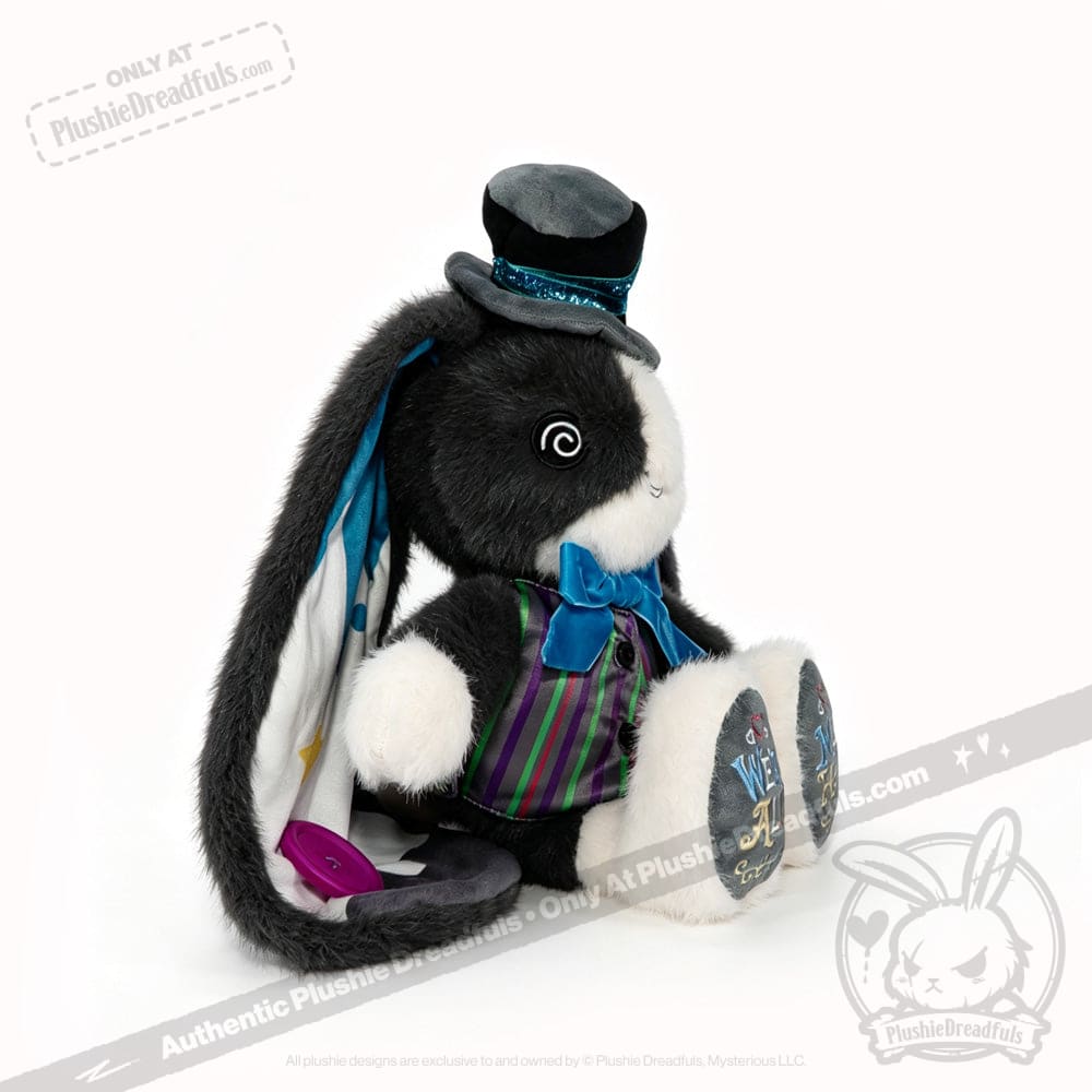 Plushie rabbit in a top hat, vest, and bow tie, channeling ADHD Mad Hatter vibes with patterned paw pads.