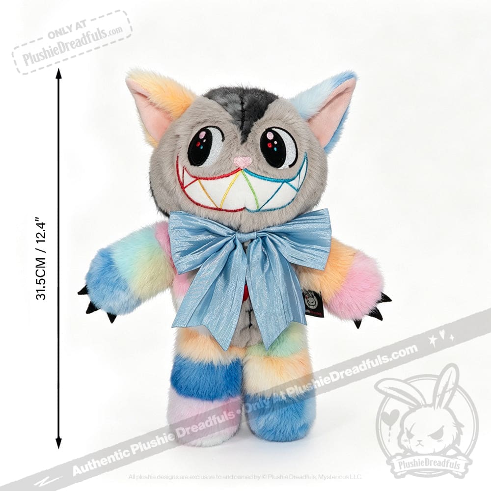 Standing upright, the Victorian McGee's Autism Acceptance Cheshire Cat Plush Stuffed Animal features rainbow-colored fur, a large blue bow, a rainbow-striped grin, and big eyes. Inspired by Alice in Wonderland plush designs, this 31.5 cm (12.4 inch) plush toy promotes autism acceptance.